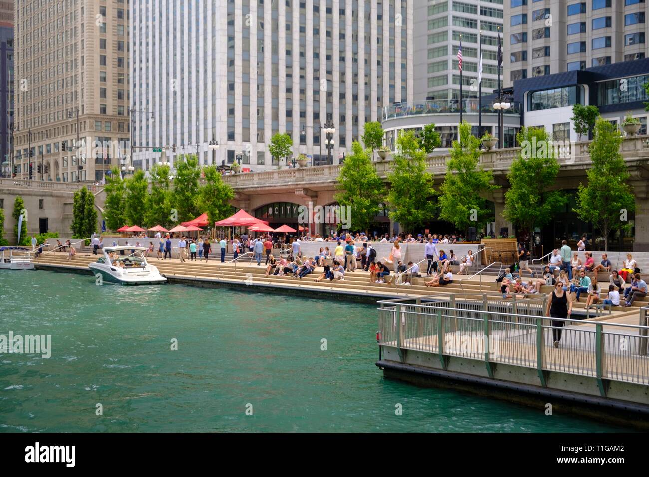 Chicago River with The River walk and surrounding downtown architecture ...