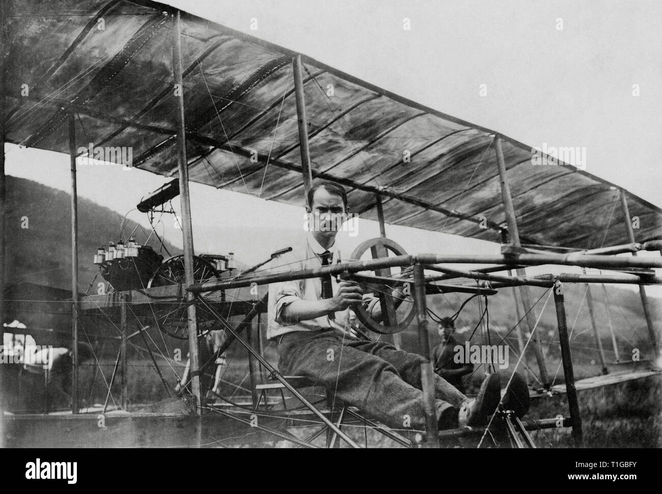 Glenn Curtiss in his bi-plane July 4th, (1908)  File Reference # 1003 745THA Stock Photo