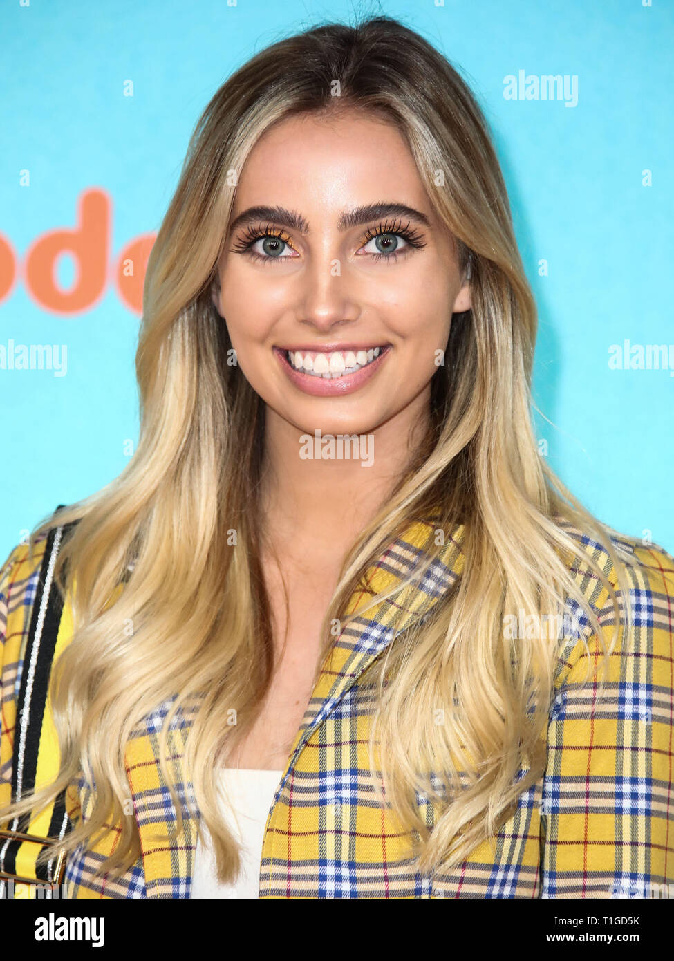 LOS ANGELES, CA, USA - MARCH 23: Lexi Hensler arrives at Nickelodeon's