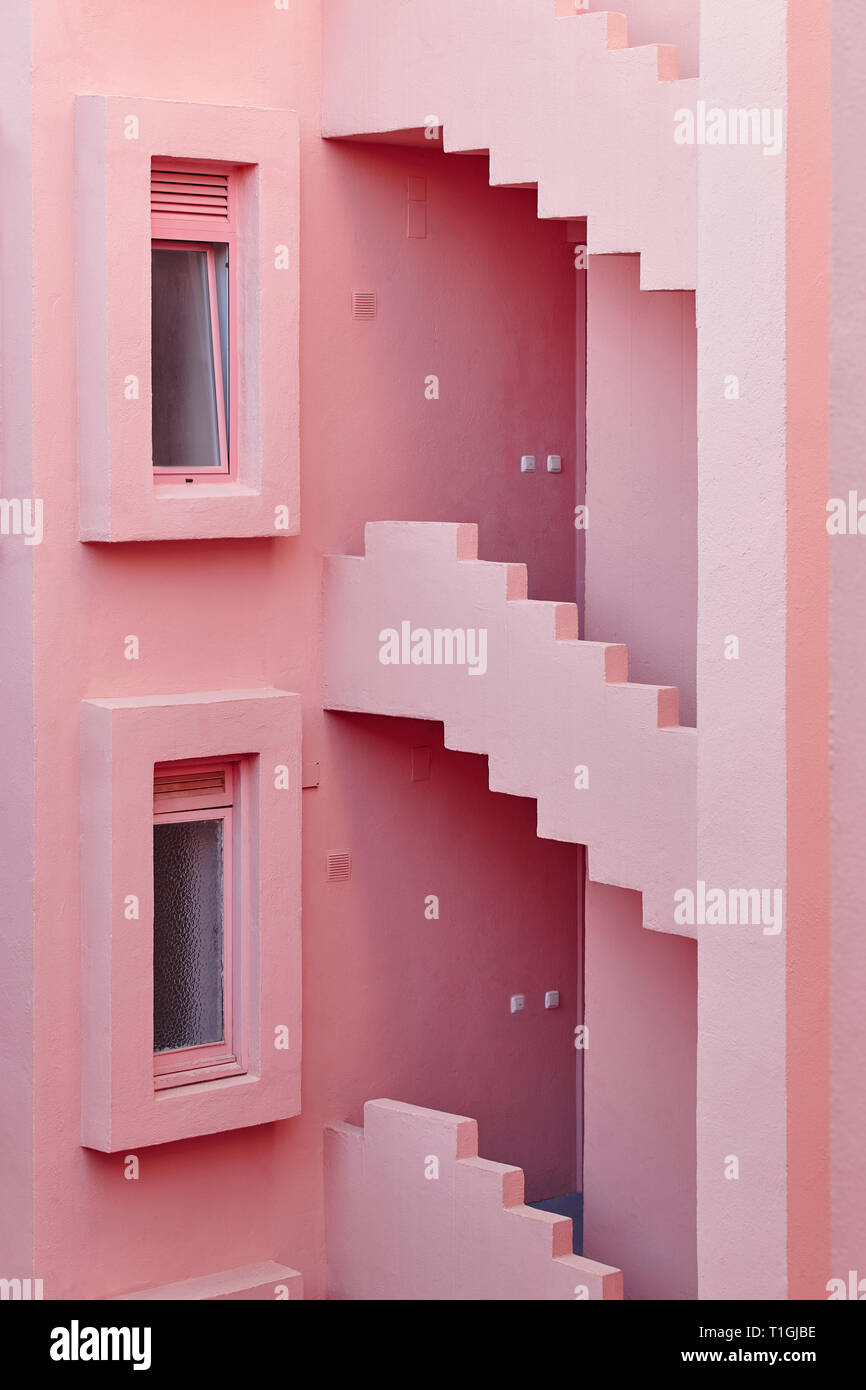 Geometric building design. The red wall, La manzanera. Calpe, Spain Stock Photo