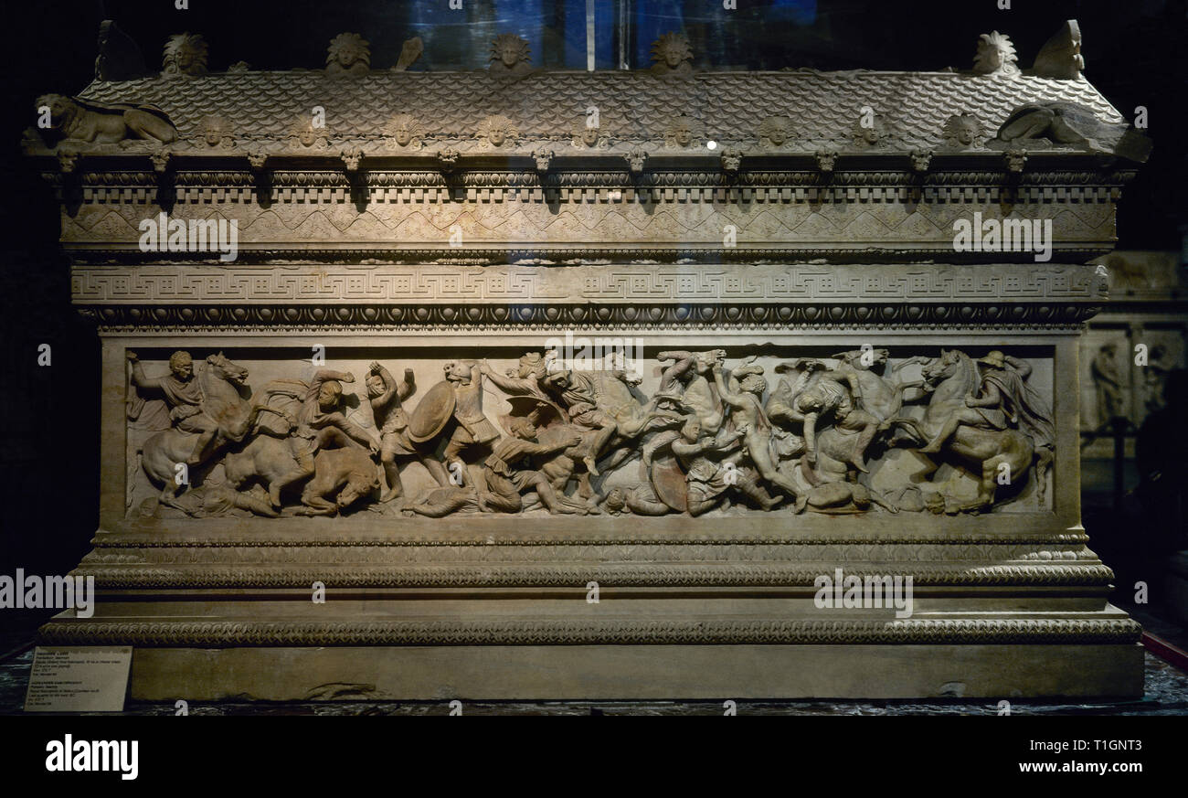 Sarcophagus of Alexander the Great (late 4th century BC). It was found in the royal necropolis of Sidon (Sayda). Pentelic marble. High relief of one of the lateral sides depicting a battle between Greeks and Persians (with long pants, anaxyrides). On the left, Alexander the Great, with the skin of the head of Lion of Nemesis, chasing a Persian soldier. Archaeological Museum. Istanbul. Turkey. Stock Photo