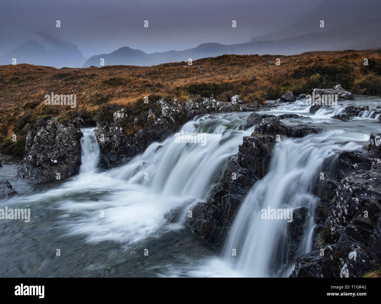 Waterfall on the Allt Dearg Mor River backed by the Cuillin Hills, Sligachan, Isle of Skye, Inner Hebrides, Scotland, UK Stock Photo