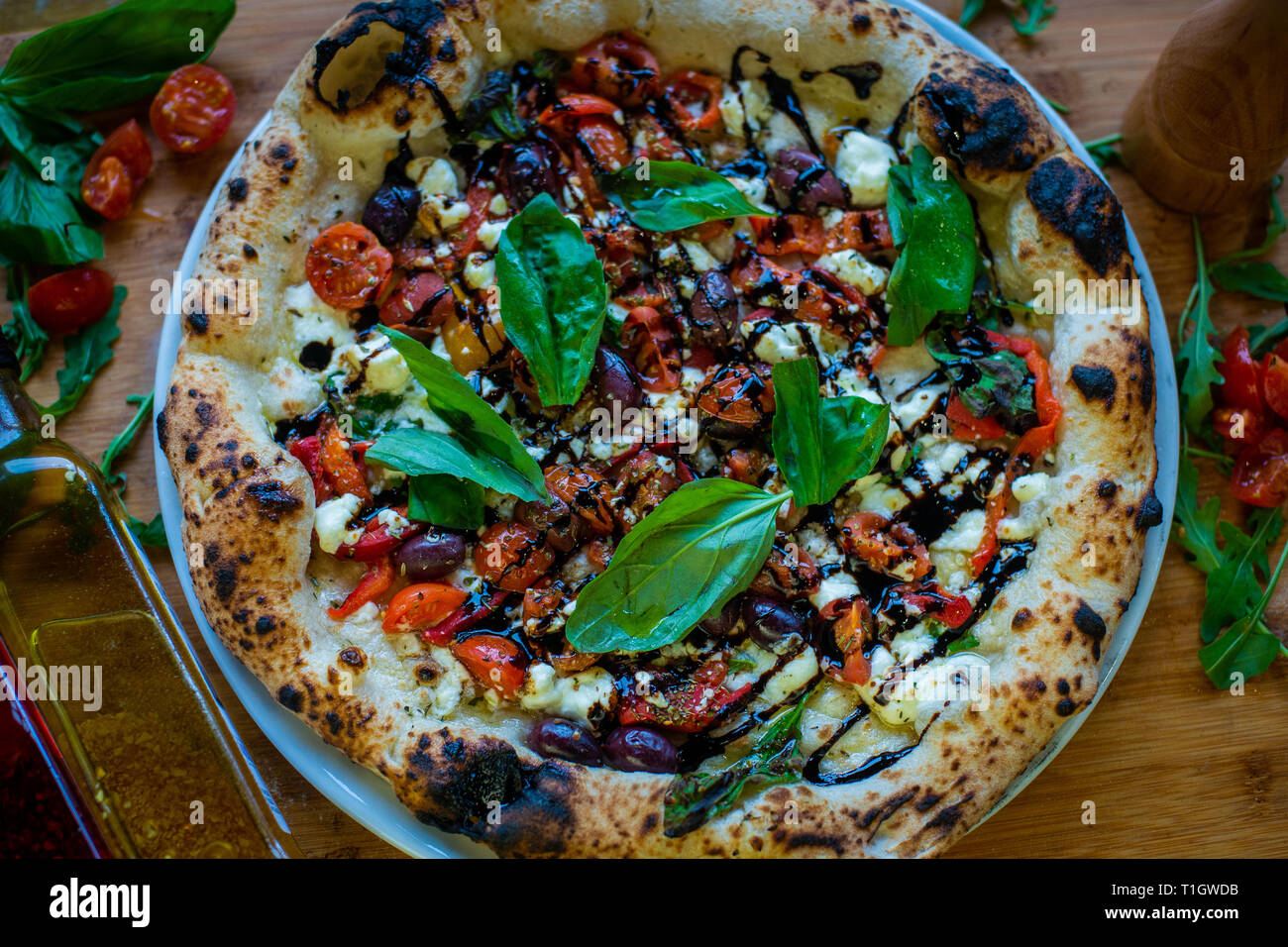 Wood fired pizza hires stock photography and images Alamy