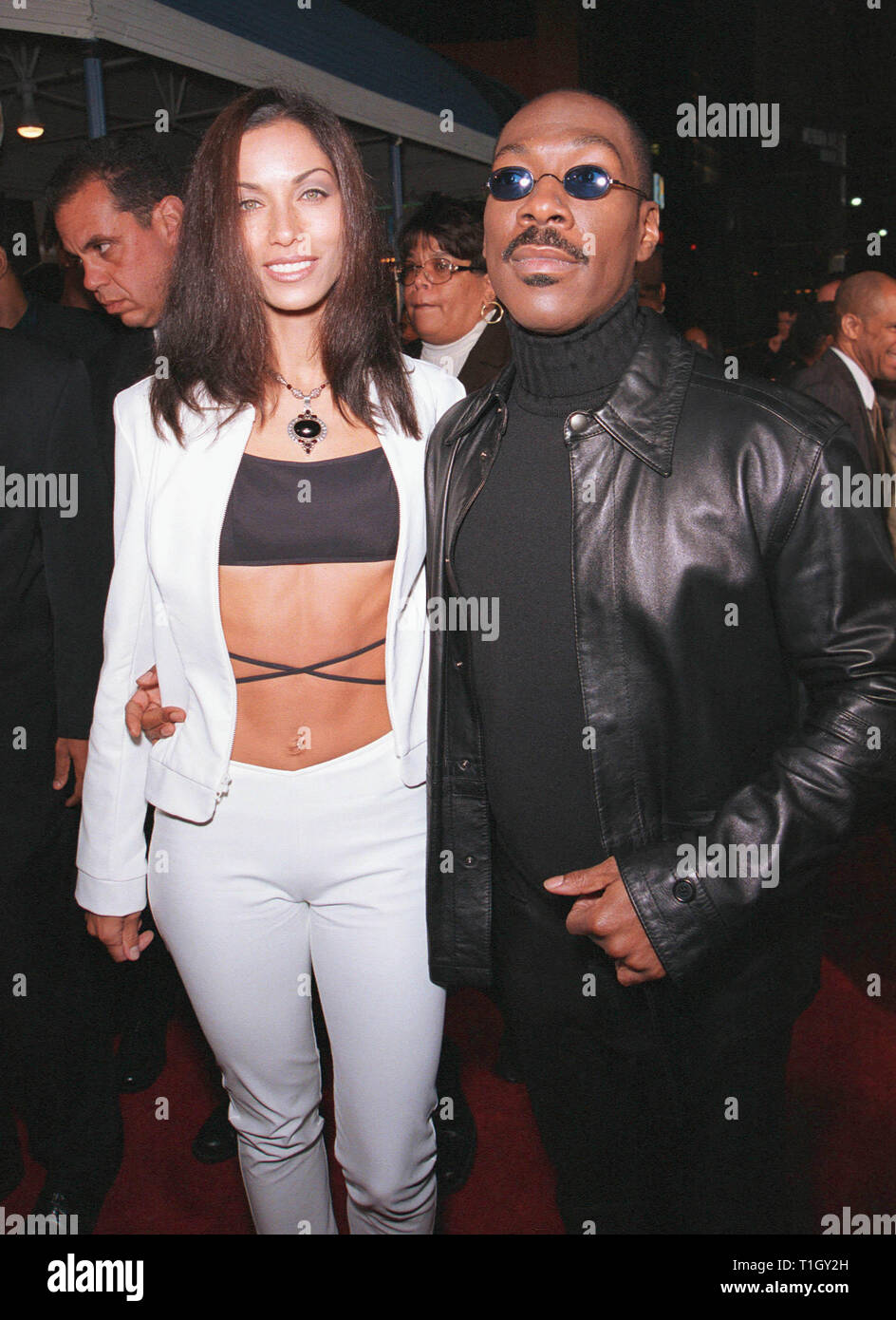 LOS ANGELES, CA - April 13, 1999: Actor EDDIE MURPHY & wife Nicole Mitchell Murphy at the world premiere in Los Angeles of his new movie 'Life' in which he stars with Martin Lawrence. © Paul Smith / Featureflash Stock Photo