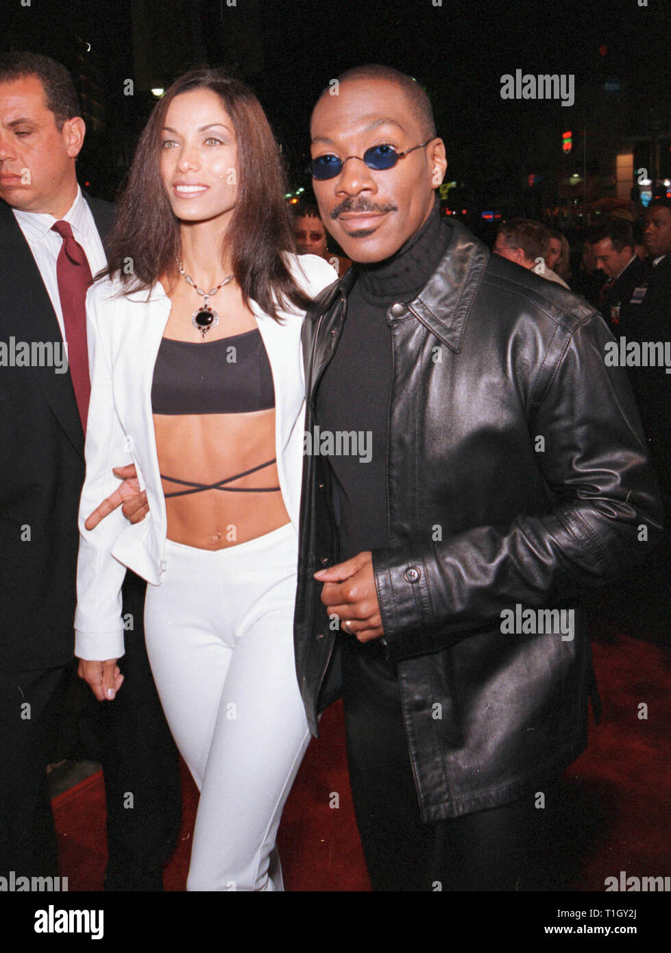 LOS ANGELES, CA - April 13, 1999: Actor EDDIE MURPHY & wife Nicole Mitchell Murphy at the world premiere in Los Angeles of his new movie 'Life' in which he stars with Martin Lawrence. © Paul Smith / Featureflash Stock Photo