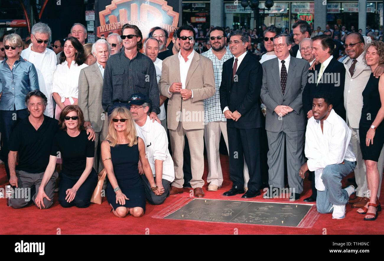 LOS ANGELES, CA. September 30, 1999:   Warner Bros. chairmen & co-CEOs Robert A. Daly & Terry Semel (in suits 5th & 6th from right) with friends & family at Mann's Chinese Theatre in Hollywood where they had their hand & footprints set in cement. © Paul Smith / Featureflash Stock Photo