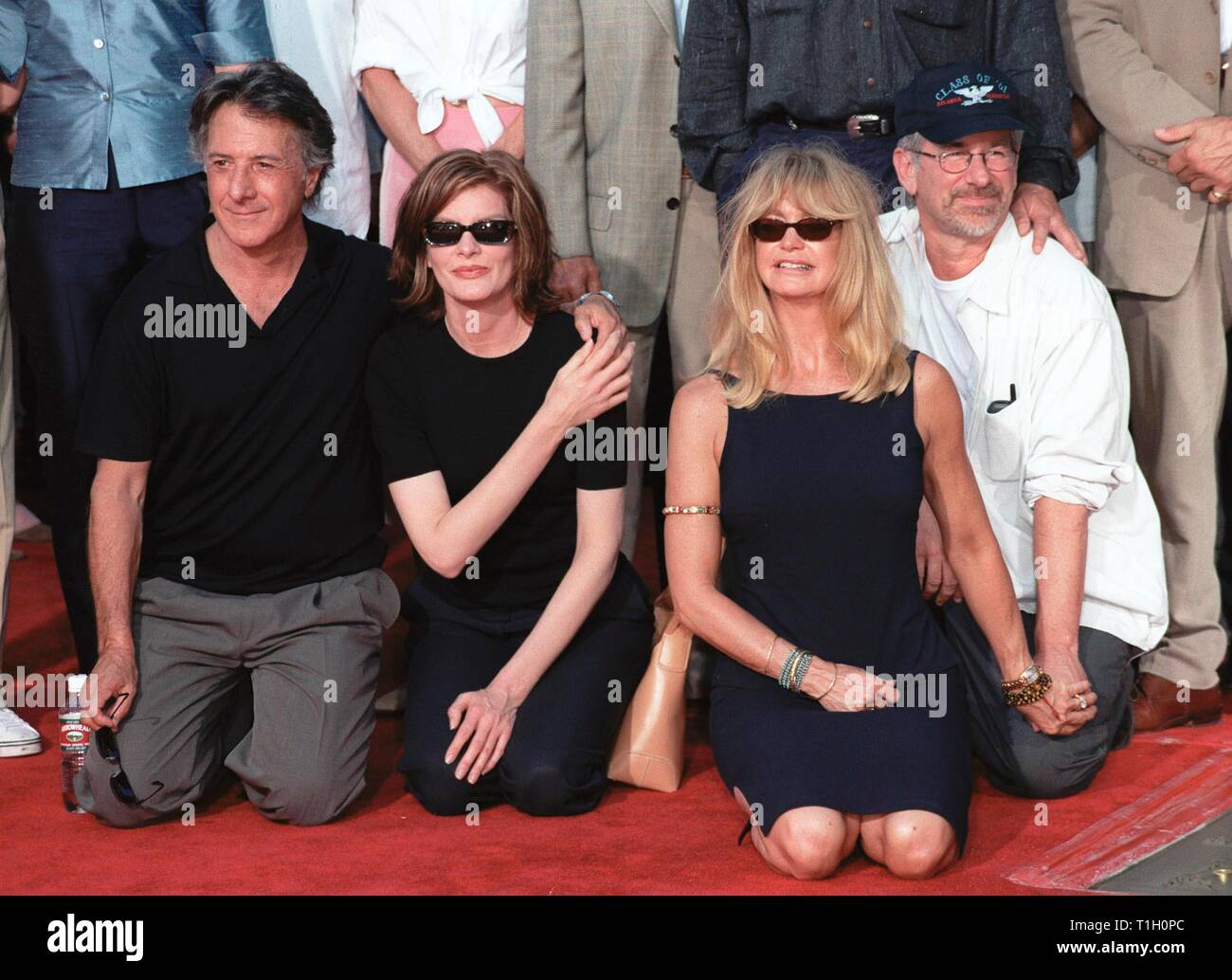 LOS ANGELES, CA. September 30, 1999:   Actors Dustin Hoffman (left), Rene Russo, Goldie Hawn & Director Steven Spielberg at Mann's Chinese Theatre in Hollywood where Warner Bros. chairmen & co-CEOs Robert A. Daly & Terry Semel had their hand & footprints set in cement.                                   © Paul Smith / Featureflash Stock Photo