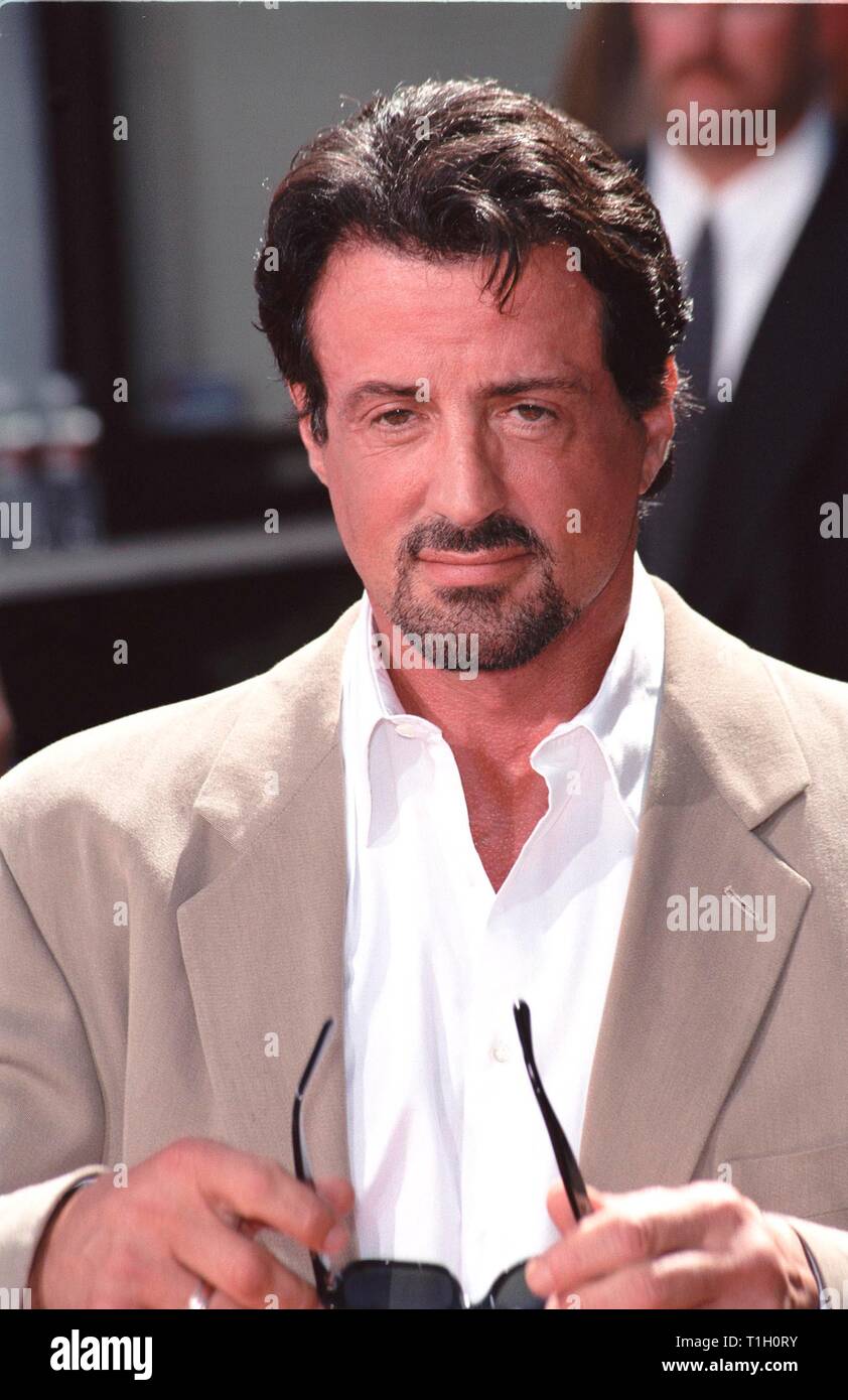LOS ANGELES, CA. September 30, 1999:   Actor Sylvester Stallone at Mann's Chinese Theatre in Hollywood where Warner Bros. chairmen & co-CEOs Robert A. Daly & Terry Semel had their hand & footprints set in cement.                                   © Paul Smith / Featureflash Stock Photo