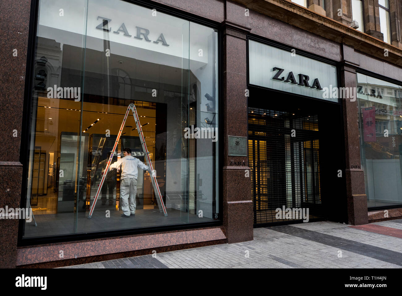 A shop fitter in Zara's Belfast Donegall Place store, ahead on media  reports the store will reopening on the 4th April ahead after has been  closed since late August, when a cordon