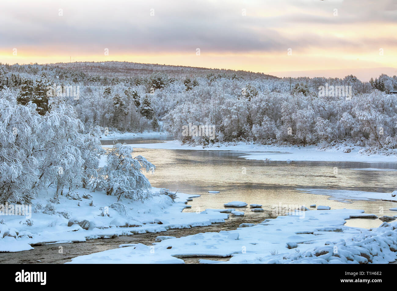 Cold winter sunrise at the river Glomma, Norway Stock Photo