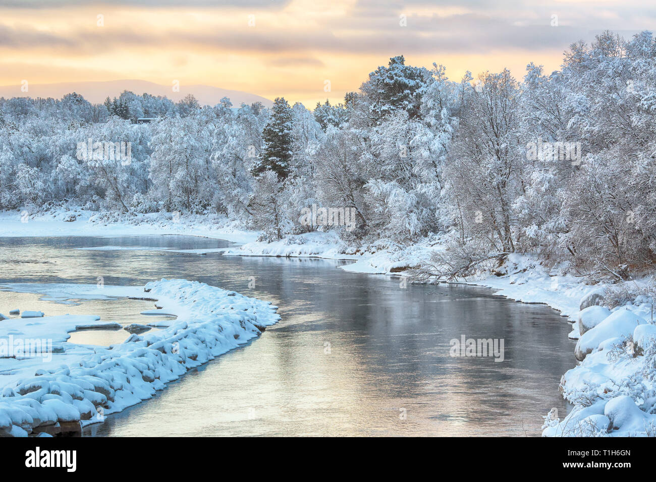 Cold winter sunrise at the norwegian river Glomma Stock Photo