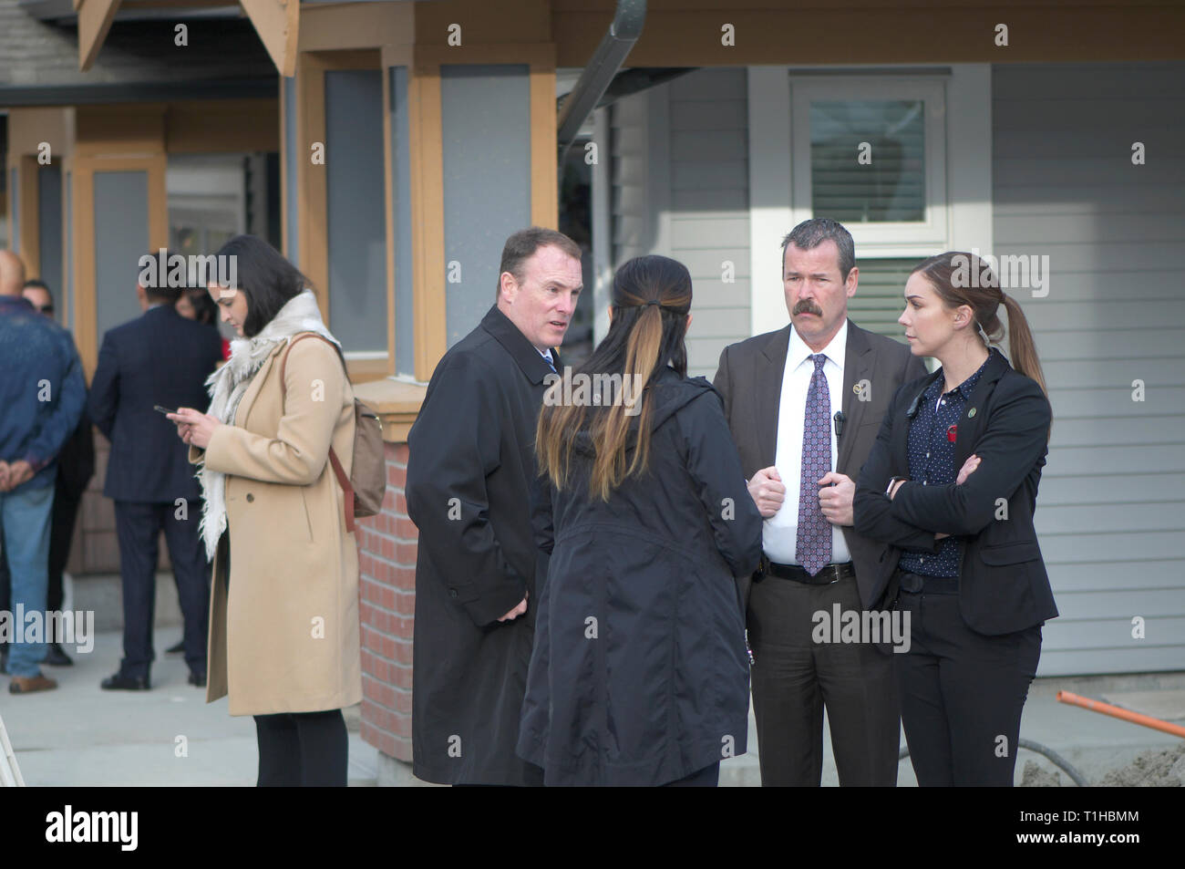 Maple Ridge, B. C. March 25, 2019.Canadian Prime Minster Justin Trudeau in Maple Ridge to address the media on affordable housing. Security staff. Stock Photo
