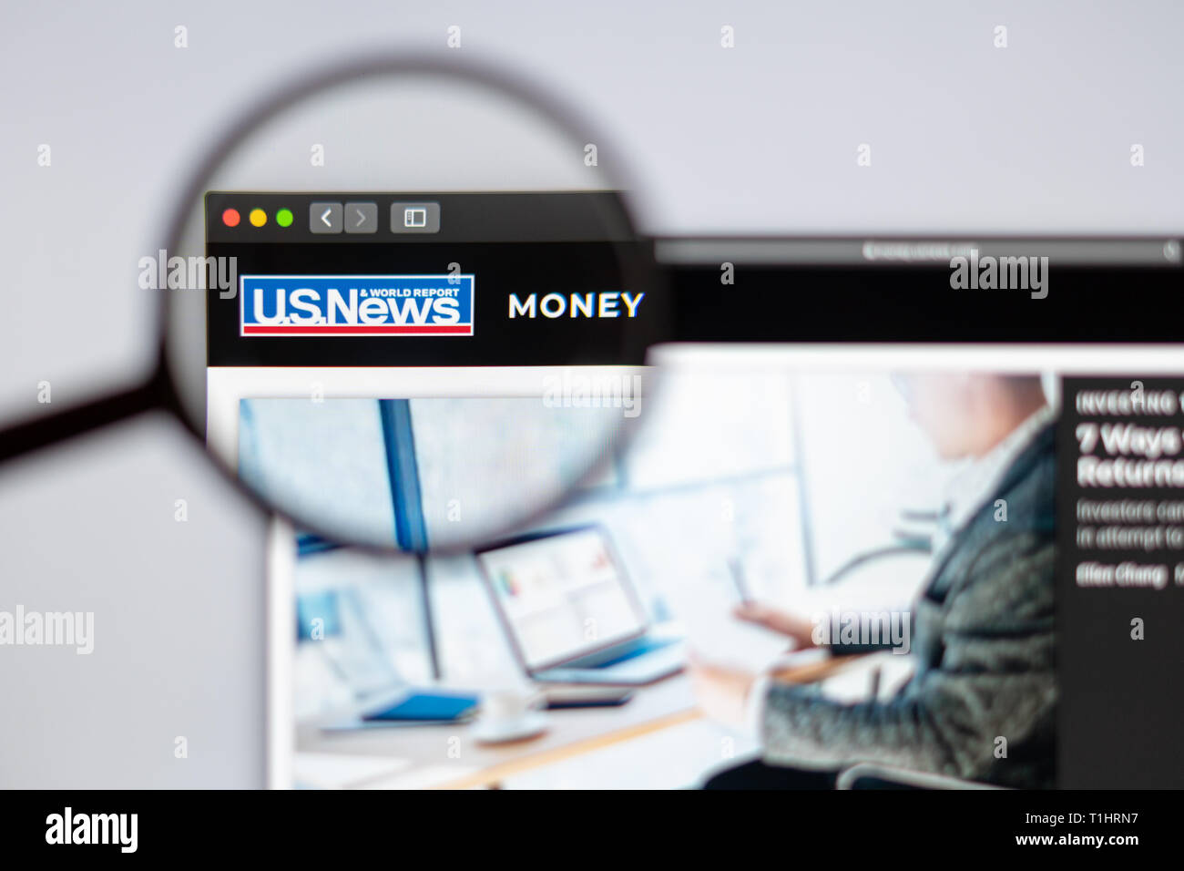 News media US News website homepage. US News logo visible through a