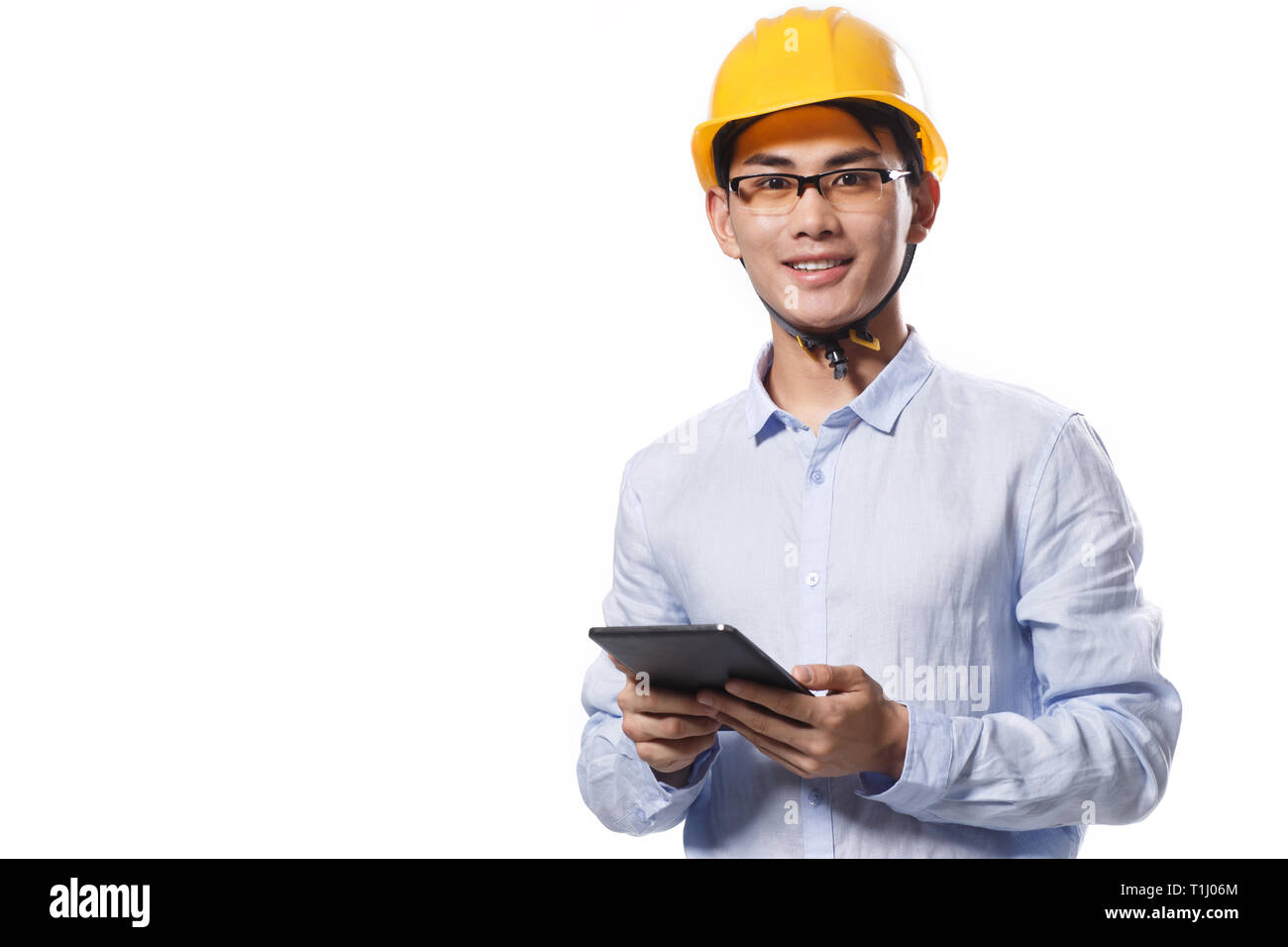 Business young man wearing a helmet Stock Photo Alamy