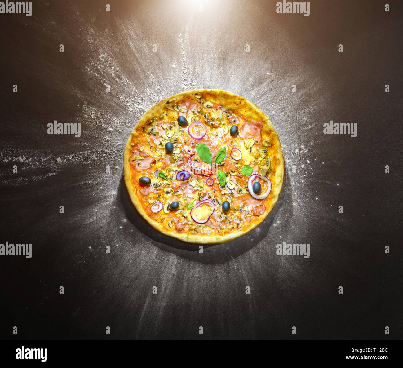 Pizza with flour around Stock Photo