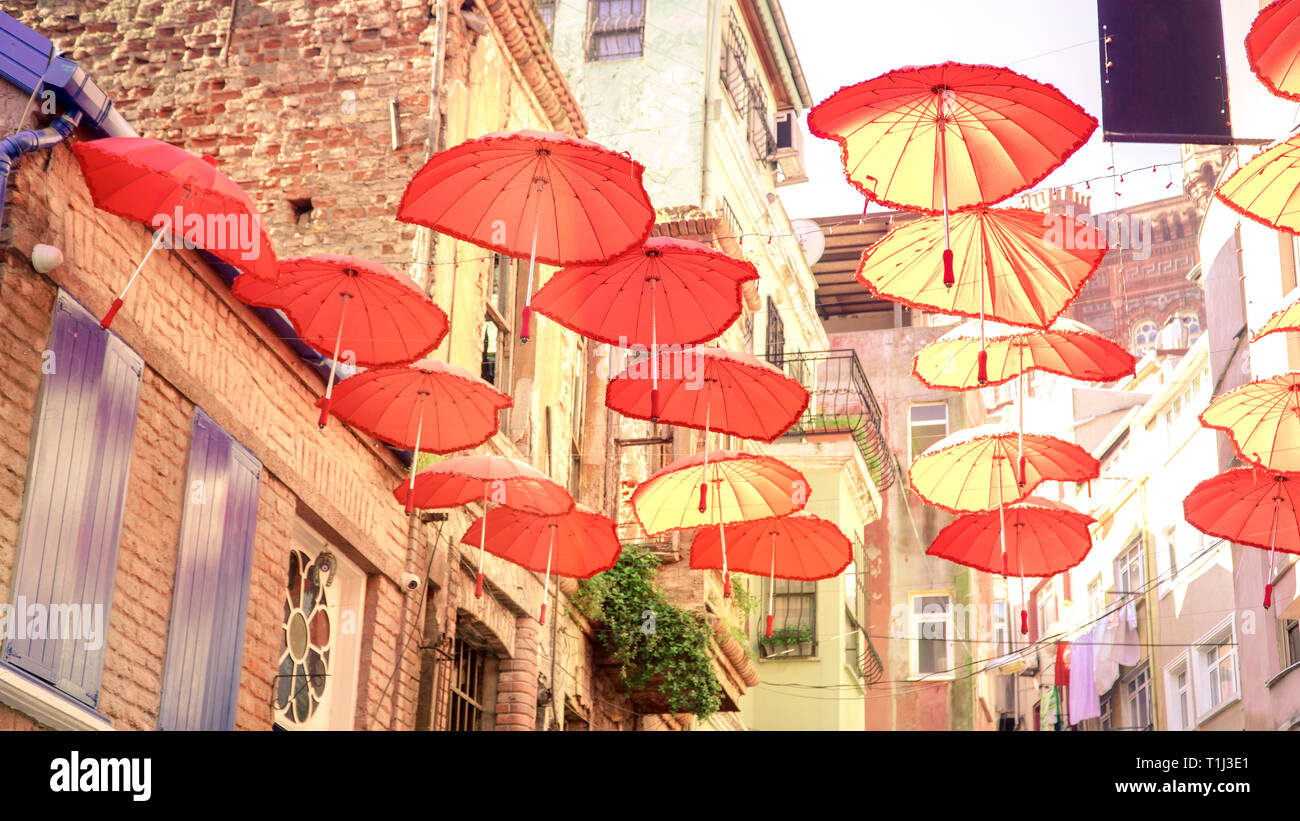 Street decorated colorful umbrellas in Balat district of Fatih, Istanbul. Stock Photo