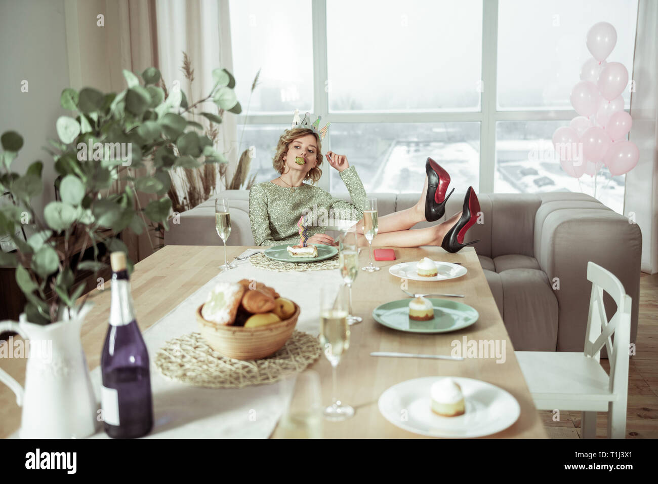 Birthday woman having no friends at her apartment for the party Stock Photo