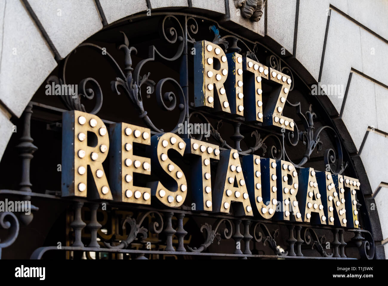 London, UK - June 22, 2018: Piccadilly Circus street with closeup of sign entrance to the Ritz hotel restaurant text Stock Photo