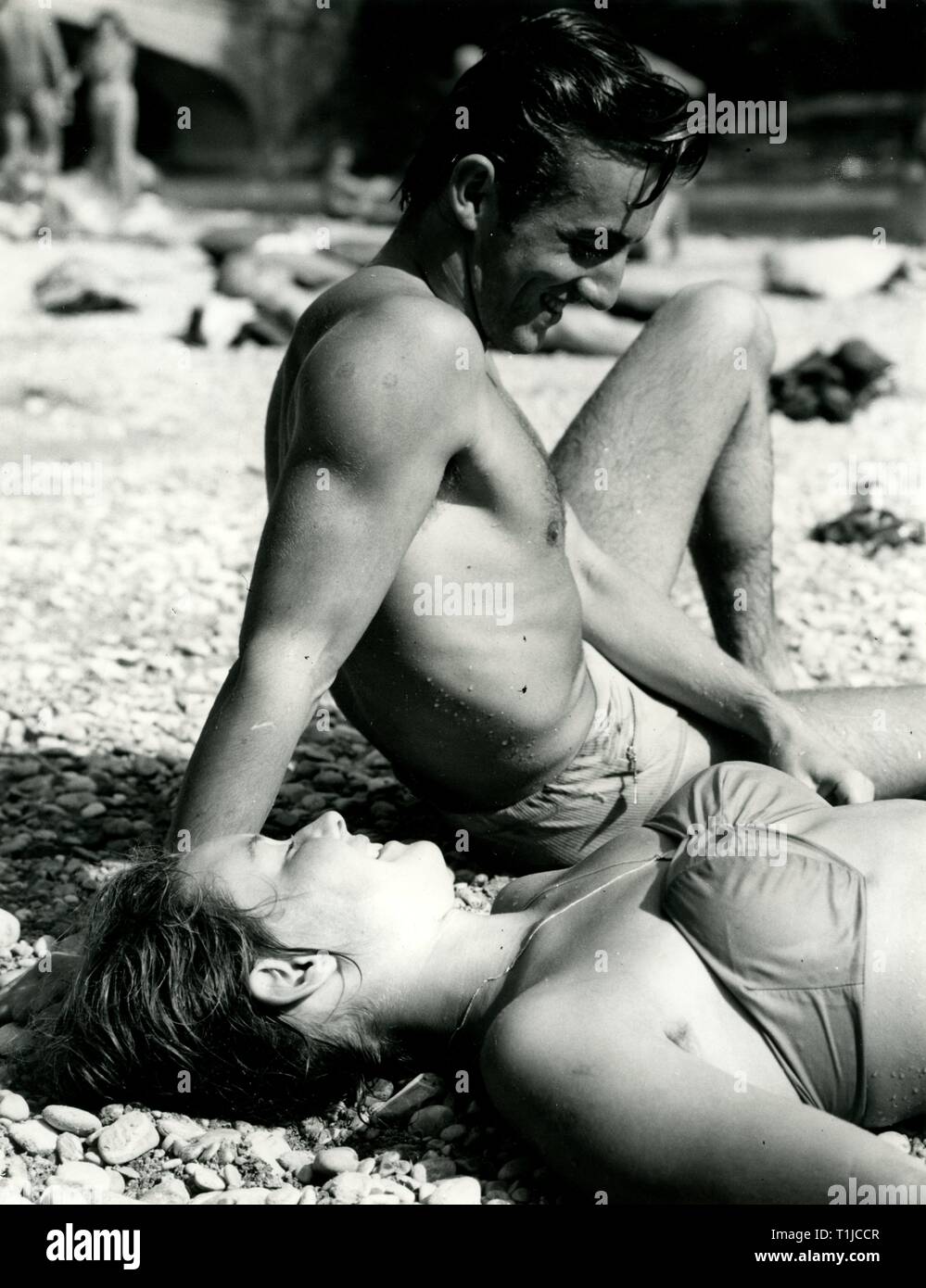 people, couples, 1960s, couple sunbathing, 1960s, Additional-Rights-Clearance-Info-Not-Available Stock Photo