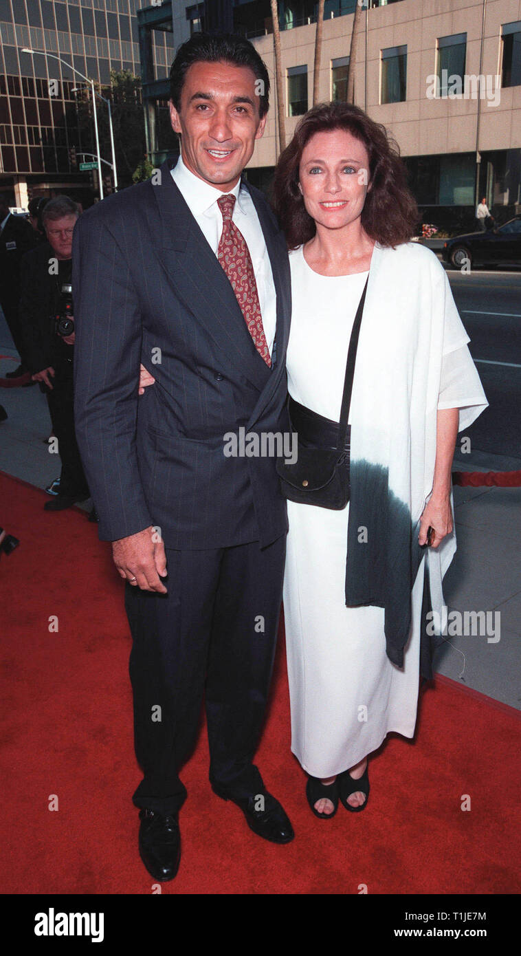 LOS ANGELES, CA - July 27, 1999:   Actress JACQUELINE BISSET & boyfriend EMIN BOZTEPE at the world premiere, in Beverly Hills, of 'The Thomas Crown Affair' which stars Pierce Brosnan & Rene Russo. © Paul Smith / Featureflash Stock Photo