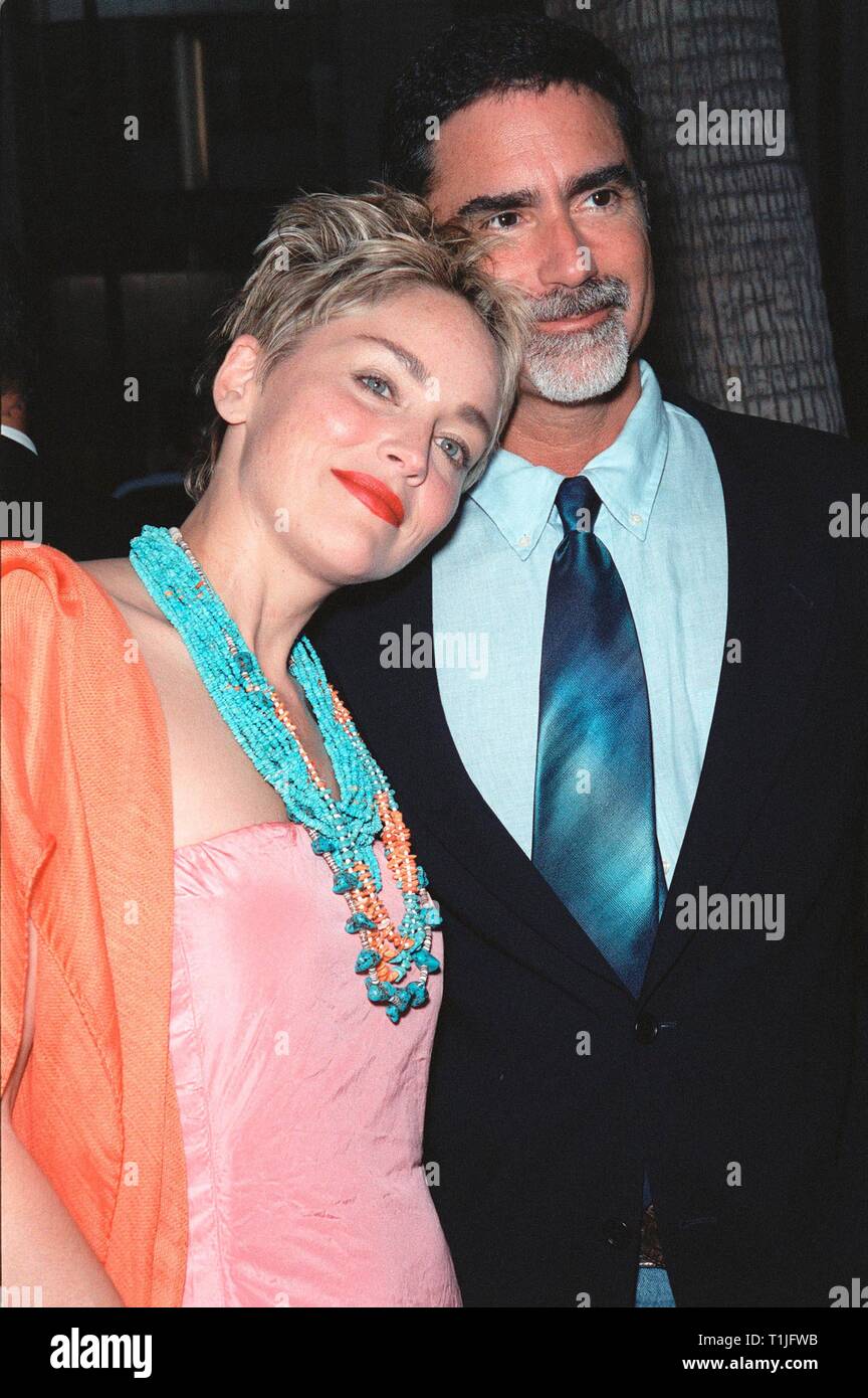 LOS ANGELES, CA - August 16, 1999: Actress SHARON STONE & husband PHIL