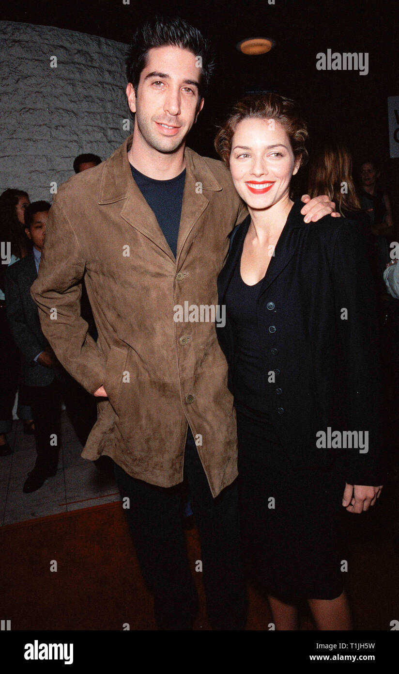 LOS ANGELES, CA. October 19, 1999: "Friends" star David Schwimmer & Actress  Girlfriend Mili Avital at Los Angeles premiere of "Three to Tango" which  stars Matthew Perry, Neve Campbell & Dylan McDermott. ©