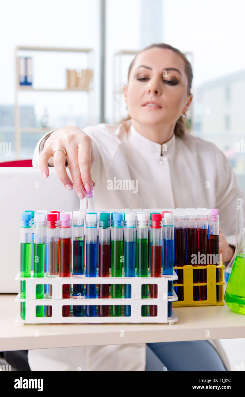 Female chemist working in medical lab Stock Photo Alamy