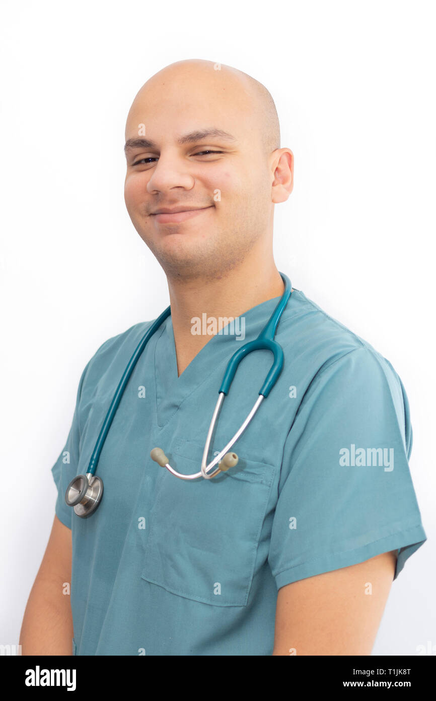 Bald doctor with medical scrubs Stock Photo