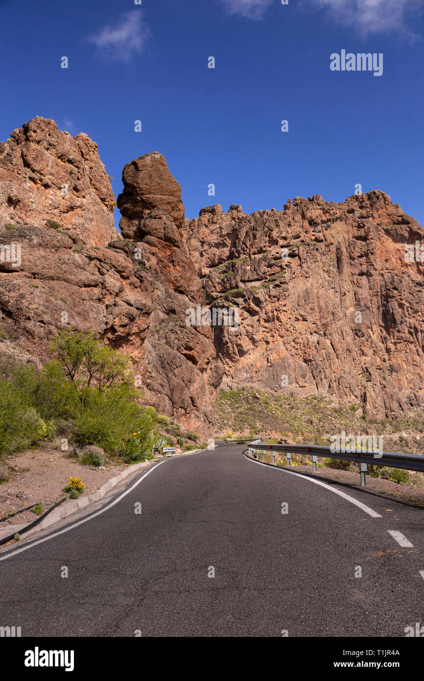 Road though volcanic landscape near Timagada on Gran Canaria, Canary Islands Stock Photo