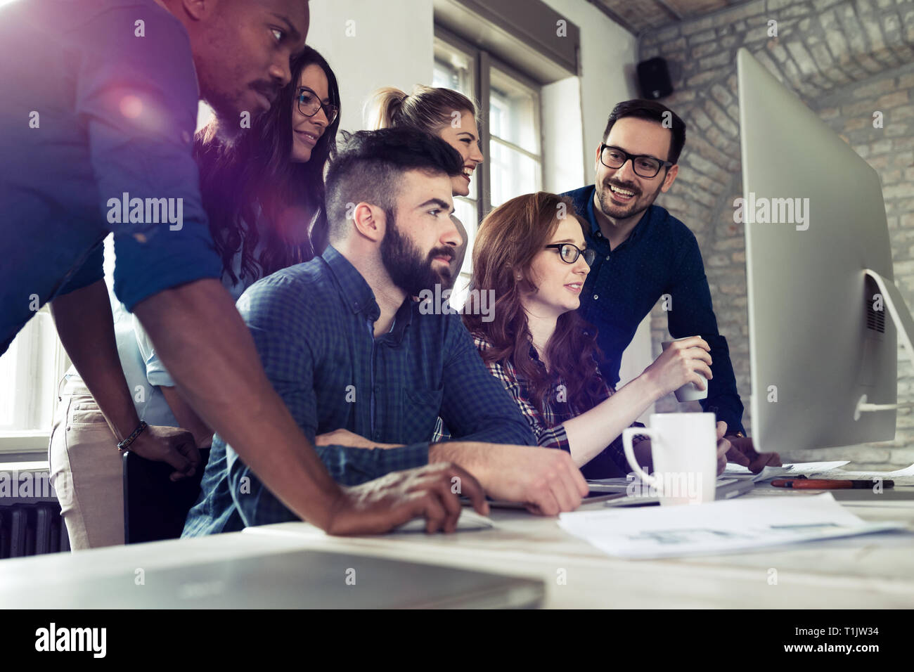 Young architects working on project in office Stock Photo