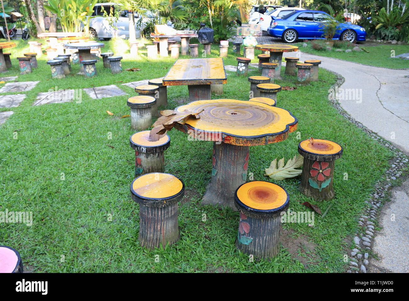 Log seats and tables for outdoor garden Stock Photo