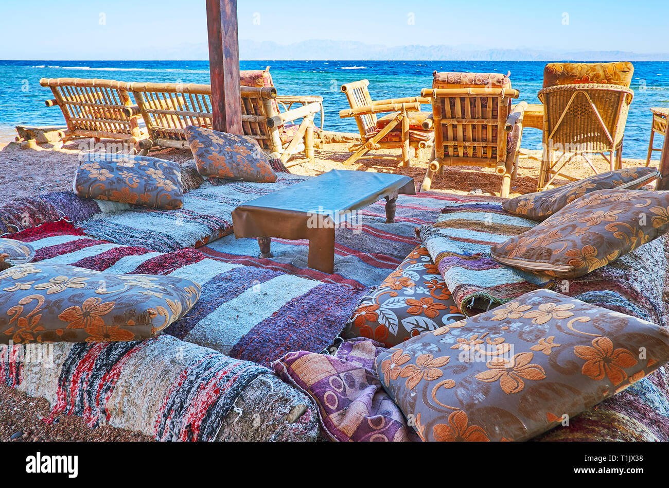 The comfortable lounge cafe on the beach of Dahab resort with a view on