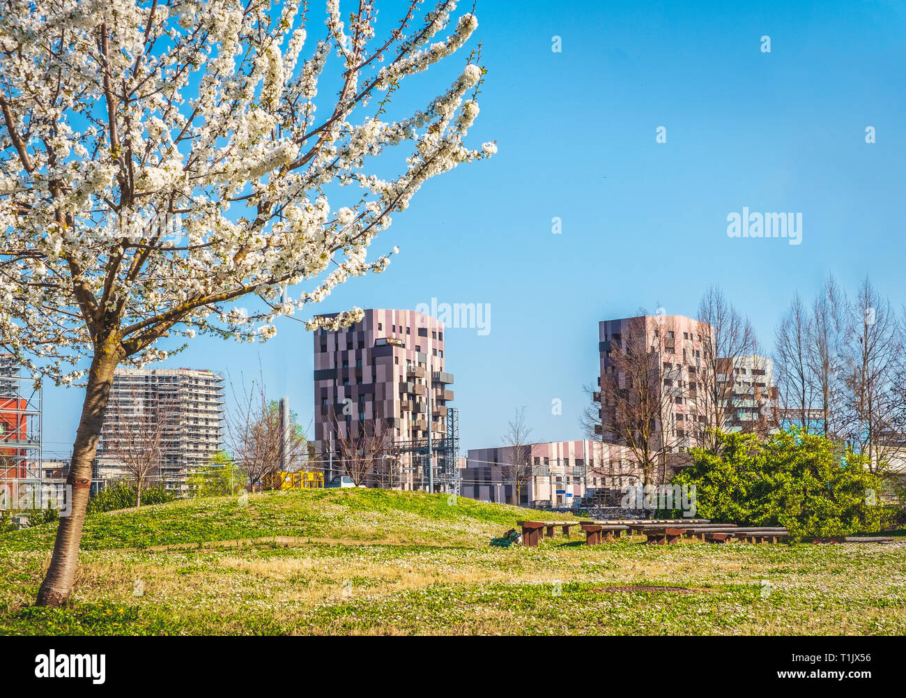 Bologna Quartiere Navile in Italy with Trilogia Navile modern building city park in spring Stock Photo