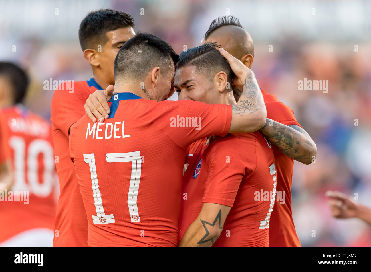 Houston, Texas, USA. 26th Mar 2019. Chile defender Gary Medel (17) celebrate Chile defender Ã®scar Opazo (15) goal during an international friendly match between USA and Chile at BBVA Compass Stadium in Houston, Texas The score at the half 1-1 © Maria Lysaker/CSM. Credit: Cal Sport Media/Alamy Live News Stock Photo