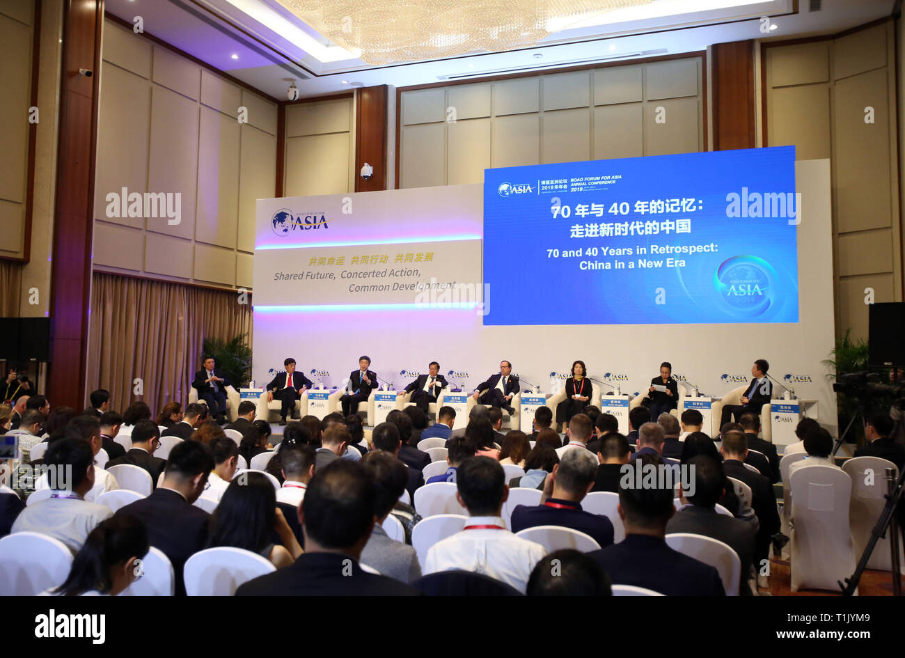 Boao. 26th Mar, 2019. Photo taken on March 26, 2019 shows the session of '70 and 40 Years in Retrospect: China in a New Era' during the Boao Forum for Asia Annual Conference 2019 in Boao, south China's Hainan Province. Credit: Sui Xiankai/Xinhua/Alamy Live News Stock Photo