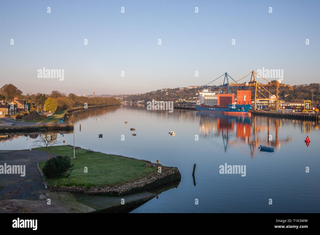 Blackrock, Cork, Ireland. 27th March, 2019. A view up the River Lee, including  the Marina and across to the Tivoli docks where the container ship BG Emerald is offloading her cargo as seen from Blackrock, Cork, Ireland. Credit: David Creedon/Alamy Live News Stock Photo
