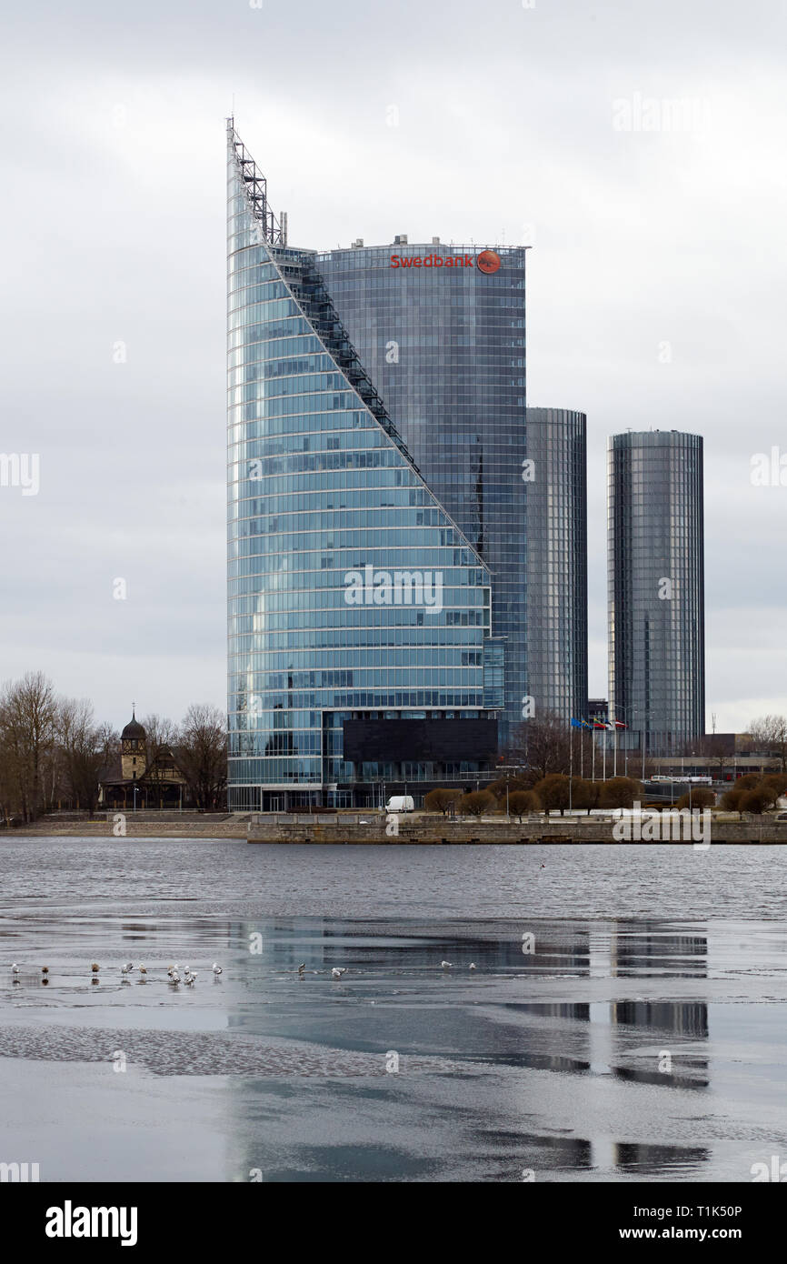 Riga, Latvia. 02nd Mar, 2019. The branch of Swedbank (l) in Latvia's  capital Riga. Swedbank is the largest bank in Sweden and the Baltic States,  according to its own figures. It had