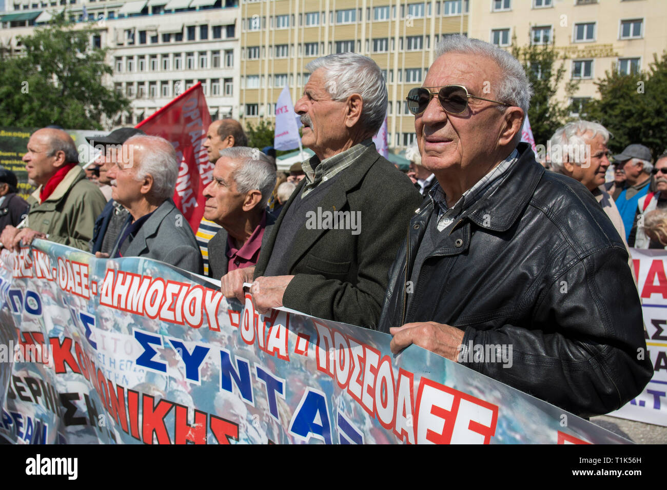 Athens, Greece. 27th Mar 2019. Pensioners march to the prime minister's office at Maximos Mansion shouting slogans against austerity and cuts in social security. Pensioners' unions took to the streets to protest over pension cuts and demand return of their slashed pensions, as their income has been shrinking since Greece entered the bailout deals in 2010. Credit: Nikolas Georgiou/Alamy Live News Stock Photo