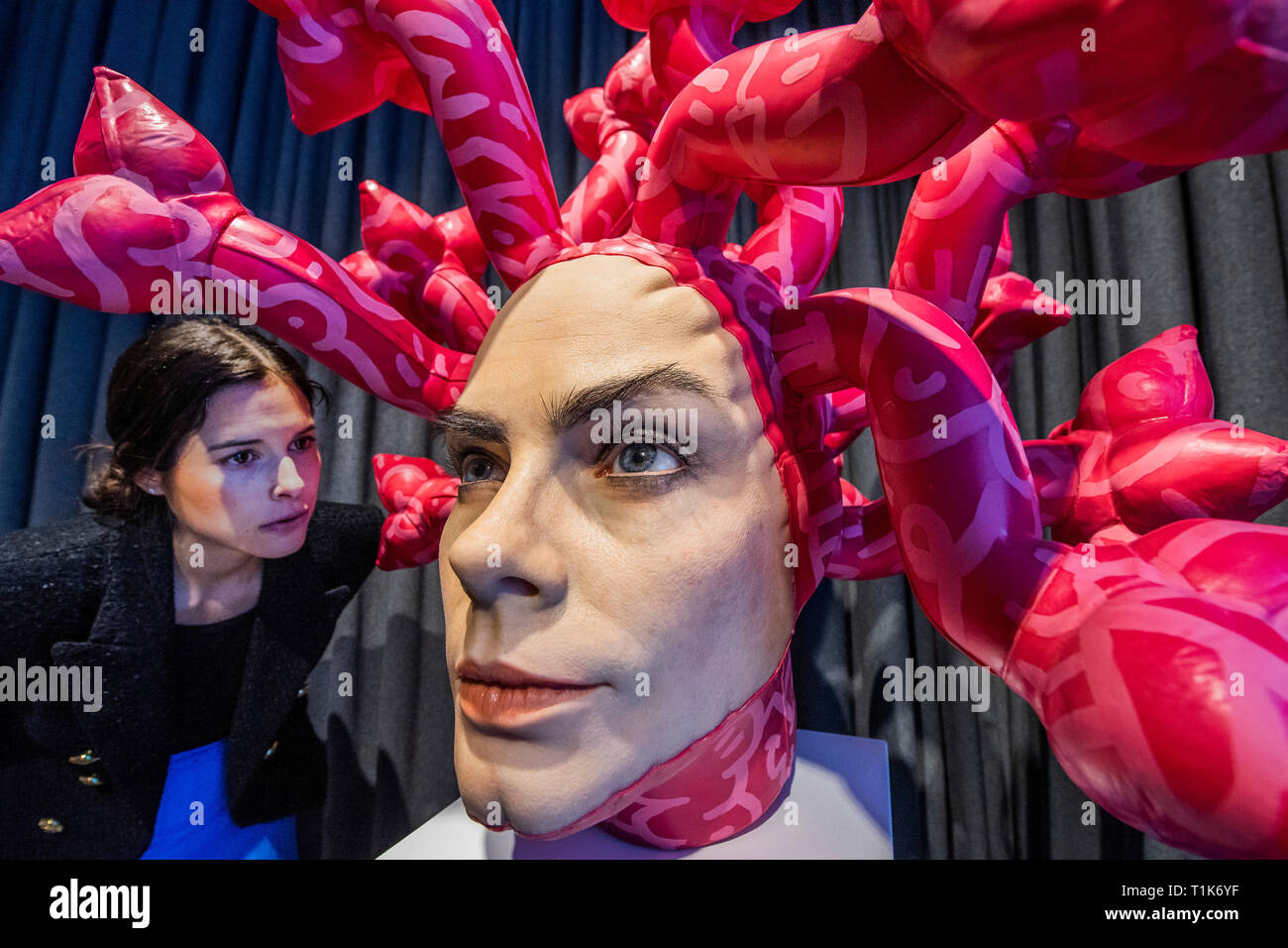 London, UK. 27th Mar, 2019. 'Olympe' by AspenCrow, a sculptural interpretation of medusa at the JD Malat Gallery - embodying the image and essence of Cara Delevigne and Olympe de Gouge.It symbolises the past, present and future of feminism which constantly evolves in the fight for gender equality. Created by AspenCrow, Edgar Askelovic, a self taught Lithuanian artist into hyperrealistic interpretive sculpture blending a mix of disciplines and techniques. 'Olympe' is made of Silicon UV resistant, resin and Acrylic Credit: Guy Bell/Alamy Live News Stock Photo