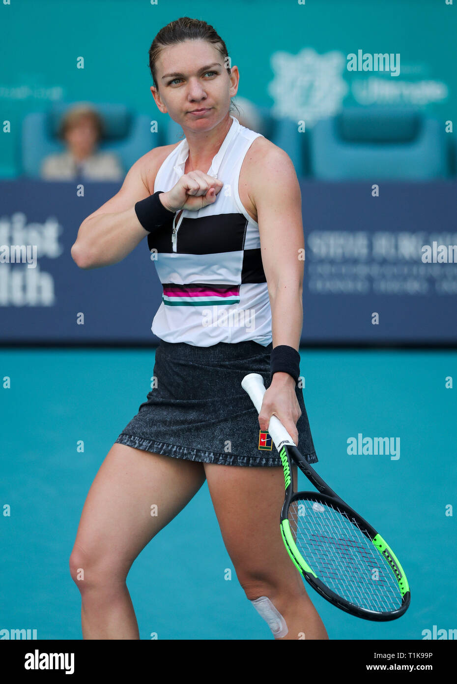 Miami Gardens, Florida, USA. 27th Mar, 2019. Simona Halep, of Romania, celebrates her victory over Qiang Wang, of China, of a quarter-finals match at the 2019 Miami Open Presented by Itau professional tennis tournament, played at the Hardrock Stadium in Miami Gardens, Florida, USA. Halep won 6-4, 7-5. Mario Houben/CSM/Alamy Live News Stock Photo