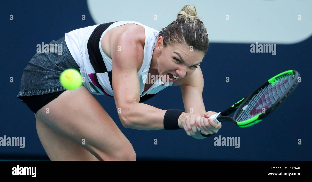 Miami Gardens, Florida, USA. 27th Mar, 2019. Simona Halep, of Romania, in action against Qiang Wang, of China, during a quarter-finals match at the 2019 Miami Open Presented by Itau professional tennis tournament, played at the Hardrock Stadium in Miami Gardens, Florida, USA. Halep won 6-4, 7-5. Mario Houben/CSM/Alamy Live News Stock Photo