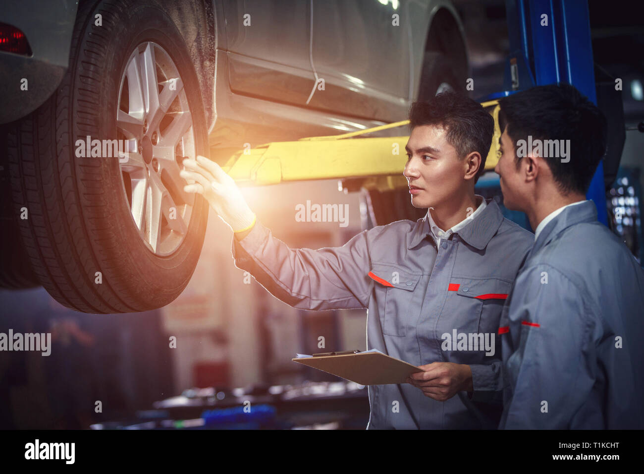 Professional auto repair personnel Stock Photo - Alamy