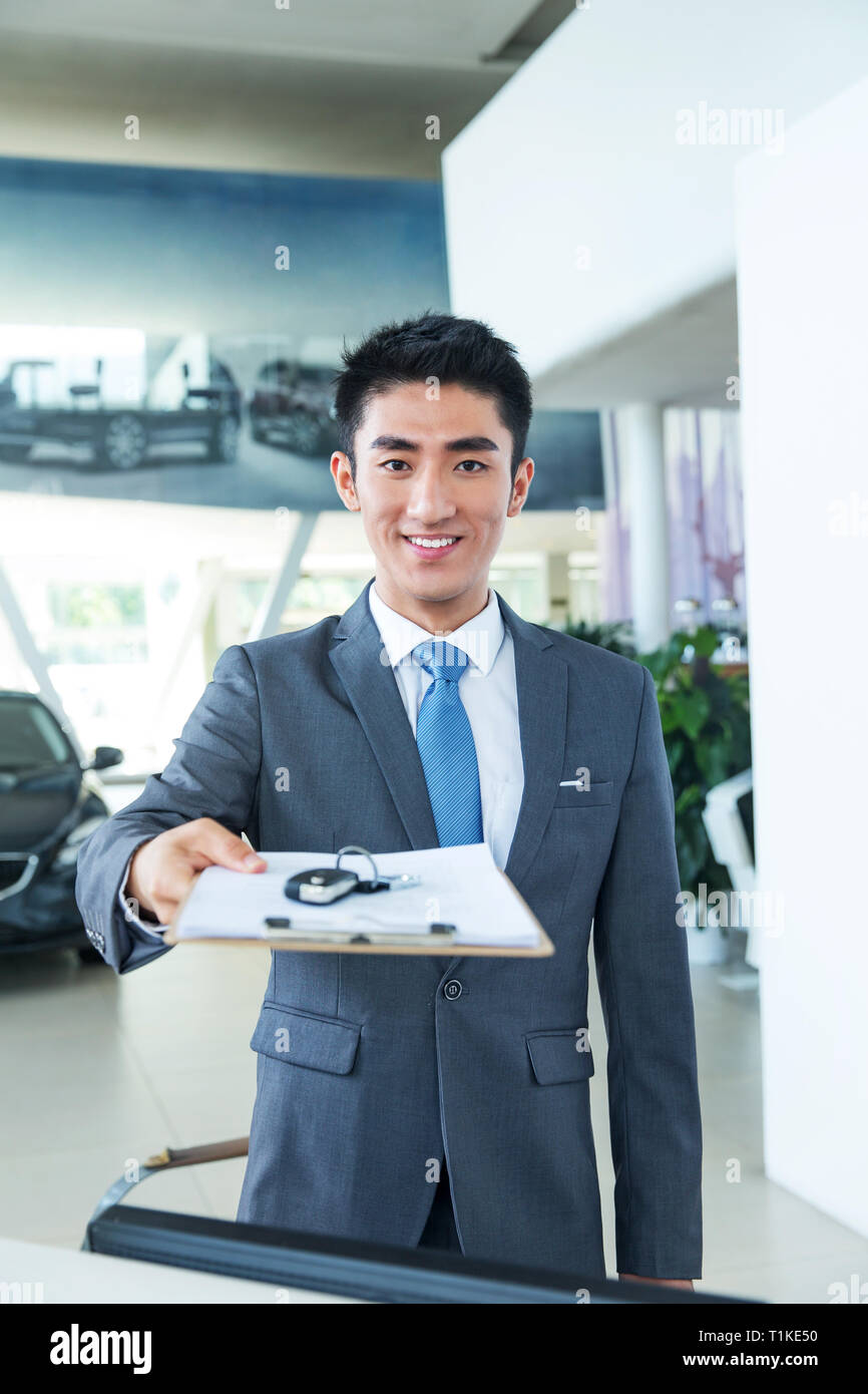 4 s shop car sales personnel Stock Photo Alamy