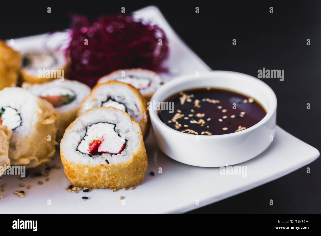 Close up Hot panko sushi roll with soy sauce and sesame Stock Photo Alamy