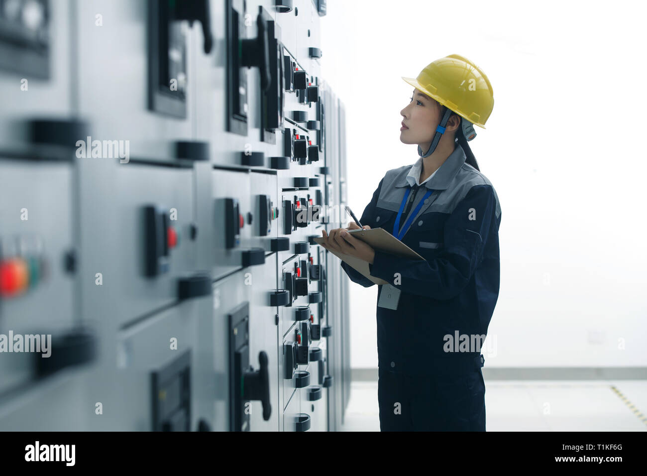 Technicians work in a factory Stock Photo