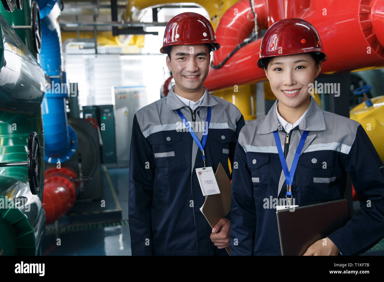 Technicians work in a factory Stock Photo