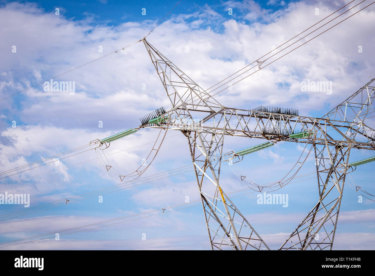 Overhead high voltage power lines Stock Photo