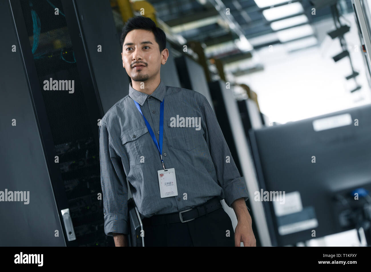 Technical personnel in the maintenance room inspection Stock Photo - Alamy