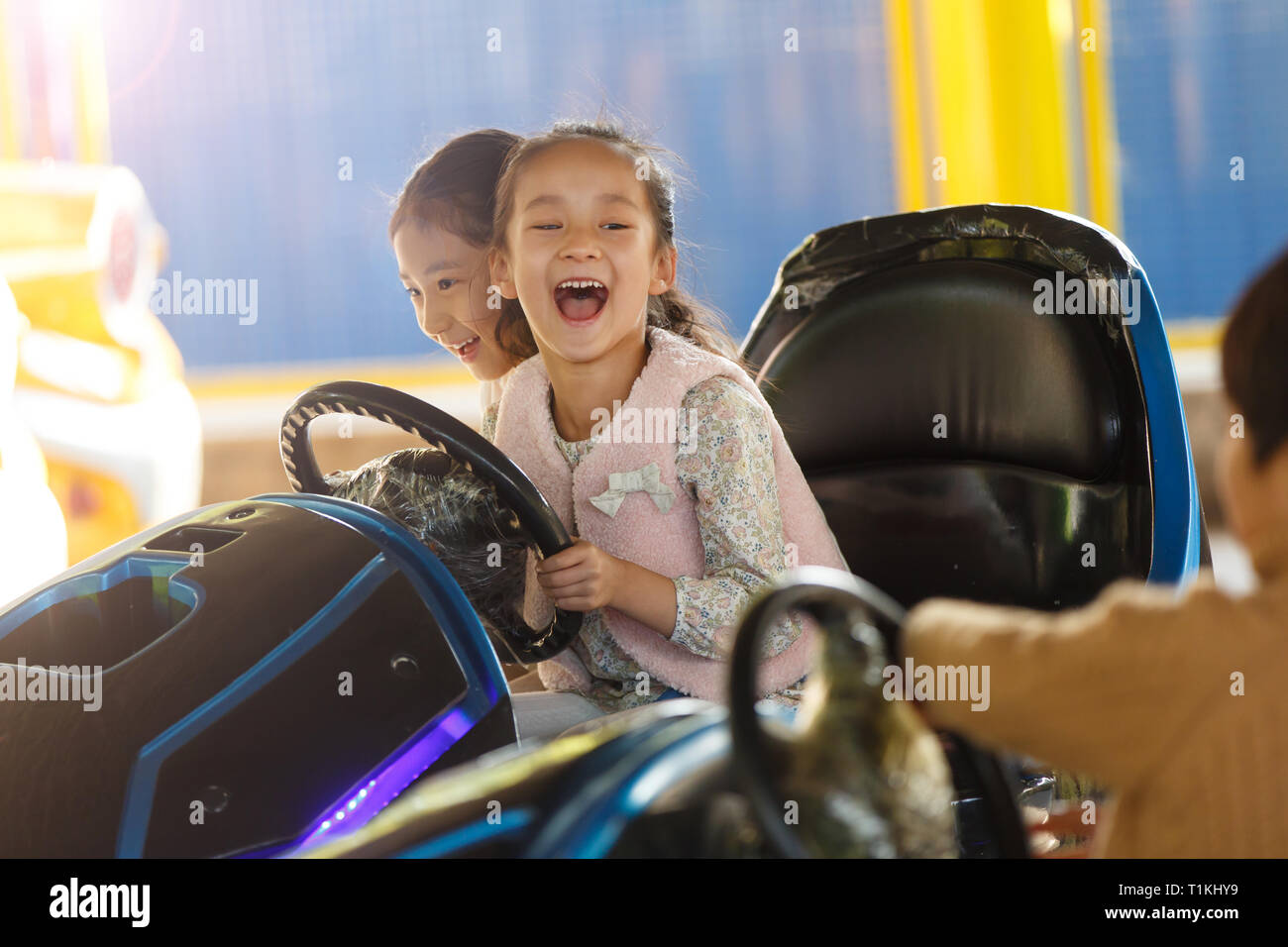 Elementary school students play in the playground Stock Photo