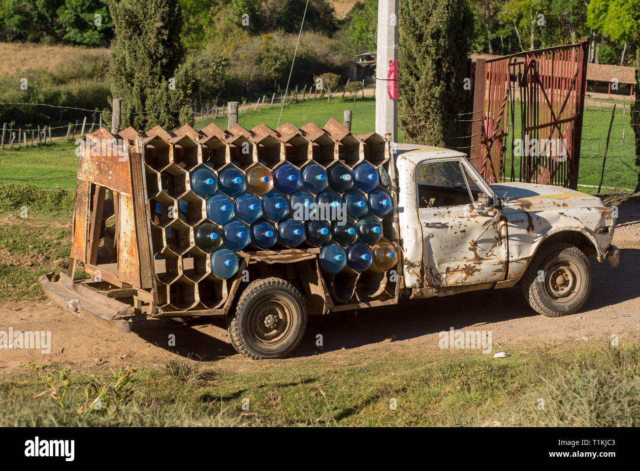 drinking water delivery truck on dusty road Stock Photo Alamy